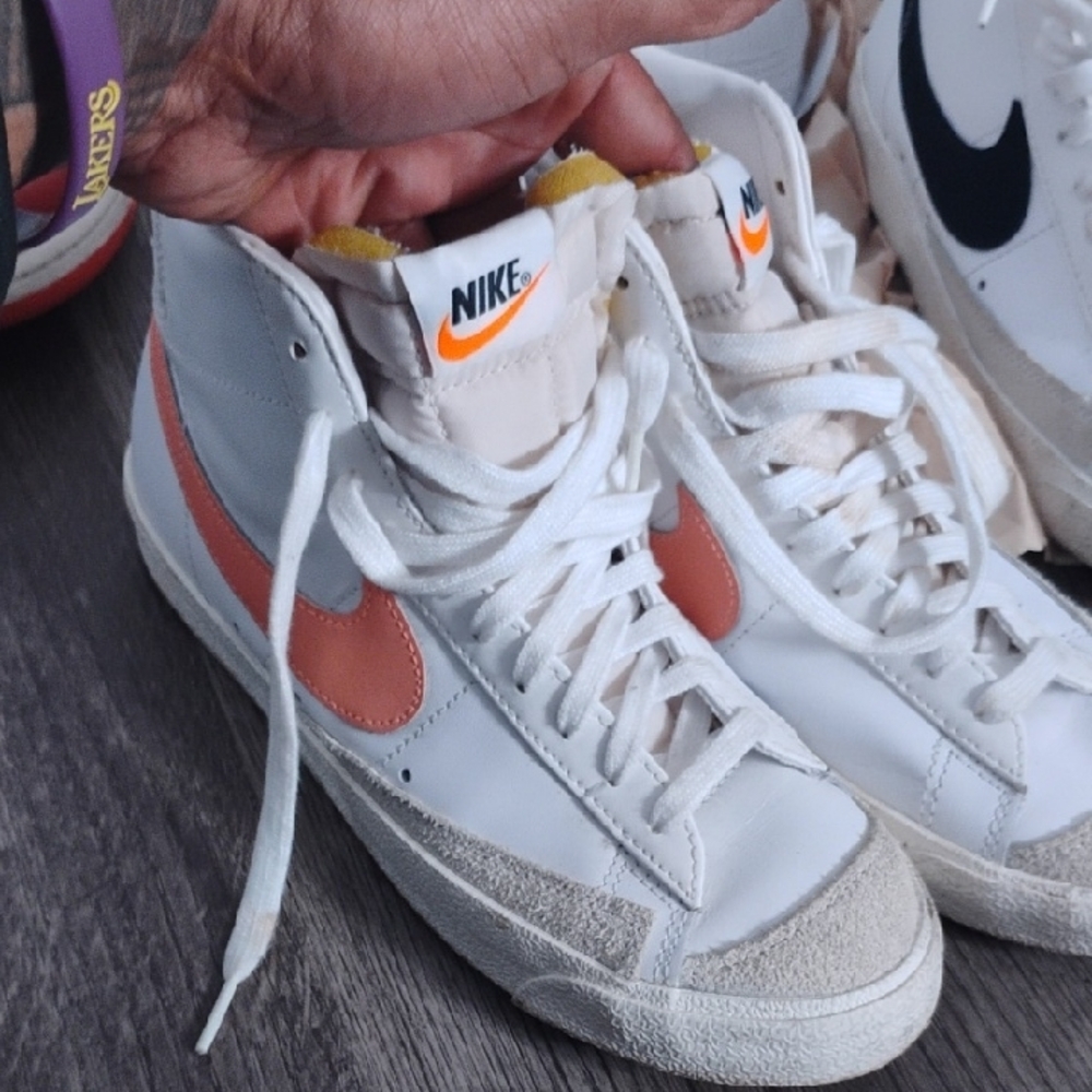Nike White High-Tops with Orange Swoosh